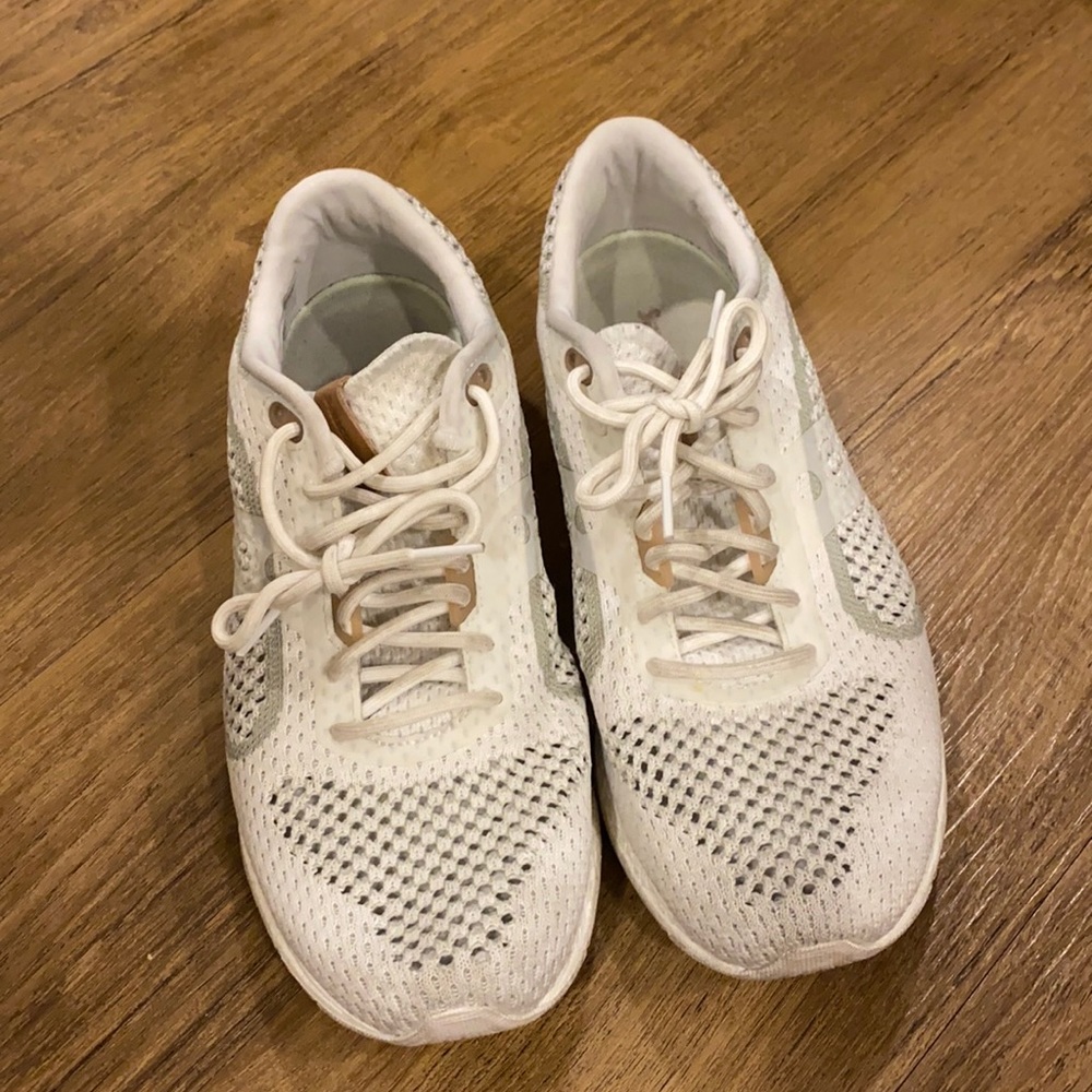 White Saucony running shoes